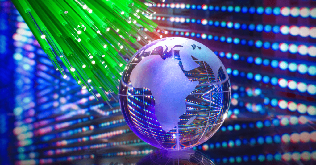 Green fiber optic cables approaching futuristic rendering of the globe